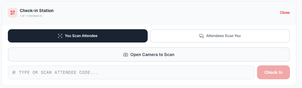 The check-in station: scan an attendee, let attendees scan you, or type the rotating attendee code